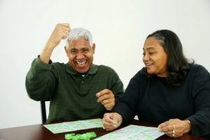 patient and caregiver playing bingo